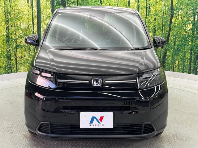 フリード e:HEVエアー EX 登録済未使用車 両側電動スライドドア 衝突軽減 アダプティブクルーズ クリアランスソナー LEDヘッドライト シートヒーター オートハイビーム 踏み間違い防止 車線逸脱警報 オートエアコン(15枚目)