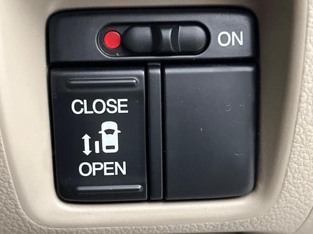 N-BOX G・Lパッケージ 禁煙車 オーディオ 電動スライドドア スマートキー オートエアコン アームレスト 純正14インチアルミ CD ステアリングスイッチ(5枚目)