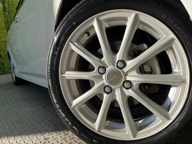 カローラフィールダー ハイブリッドＧ　エアロツアラー・ダブルバイビー　純正ナビ　バックカメラ　禁煙車　ハーフレザーシート　スマートキー　ＨＩＤヘッド　ビルトインＥＴＣ　オートライト　オートエアコン　Ｂｌｕｅｔｏｏｔｈ　ＣＤ　ＤＶＤ再生　フルセグ（14枚目）