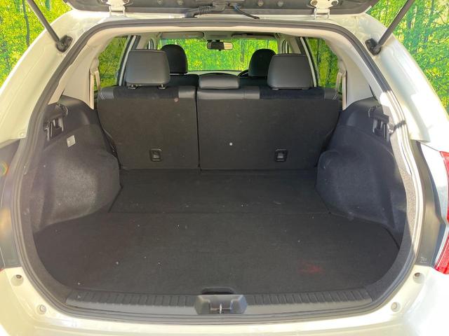 カローラフィールダー ハイブリッドＧ　エアロツアラー・ダブルバイビー　純正ナビ　バックカメラ　禁煙車　ハーフレザーシート　スマートキー　ＨＩＤヘッド　ビルトインＥＴＣ　オートライト　オートエアコン　Ｂｌｕｅｔｏｏｔｈ　ＣＤ　ＤＶＤ再生　フルセグ（35枚目）