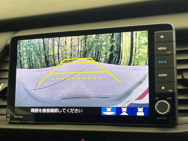 フィット ｅ：ＨＥＶホーム　フルエアロ　バックカメラ　衝突被害軽減システム　禁煙車　ドラレコ　コーナーセンサー　スマートキー　ＬＥＤヘッド　ＥＴＣ　純正１６インチアルミ　オートハイビーム　車線逸脱警報　オートライト（5枚目）