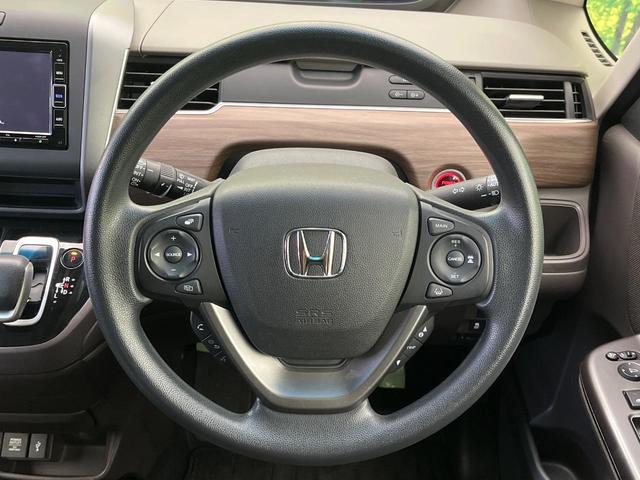 フリードハイブリッド ハイブリッド・Ｇホンダセンシング　禁煙車　純正ナビ　両側パワスラ　バックカメラ　ホンダセンシング　レーダークルーズコントロール　ドラレコ　スマートキー　ＬＥＤヘッド　ＥＴＣ　ロールサンシェード　オートライト　Ｂｌｕｅｔｏｏｔｈ（13枚目）