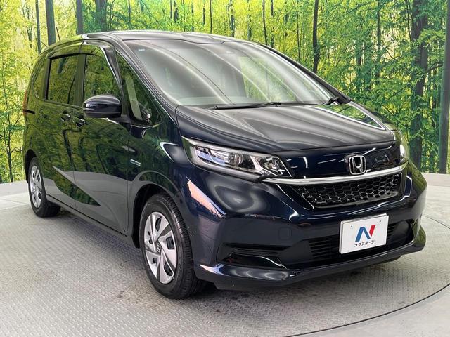 フリードハイブリッド ハイブリッド・Ｇホンダセンシング　禁煙車　純正ナビ　両側パワスラ　バックカメラ　ホンダセンシング　レーダークルーズコントロール　ドラレコ　スマートキー　ＬＥＤヘッド　ＥＴＣ　ロールサンシェード　オートライト　Ｂｌｕｅｔｏｏｔｈ（18枚目）