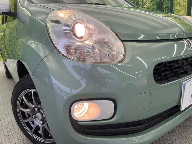 パッソ プラスハナ　ビルトインＥＴＣ　１４インチアルミホイール　オートエアコン　フォグライト　ＣＤプレーヤー　プライバシーガラス　アイドリングストップ　横滑防止装置　トラクションコントロール　ヘッドライトレベライザー（13枚目）