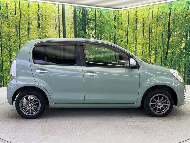 パッソ プラスハナ　ビルトインＥＴＣ　１４インチアルミホイール　オートエアコン　フォグライト　ＣＤプレーヤー　プライバシーガラス　アイドリングストップ　横滑防止装置　トラクションコントロール　ヘッドライトレベライザー（29枚目）