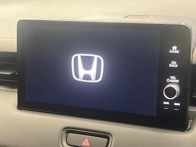 ヴェゼル ｅ：ＨＥＶ　Ｚ　９型メーカーナビ　バックカメラ　衝突被害軽減システム　禁煙車　電動リアゲート　ハーフレザーシート　前後ドラレコ　コーナーセンサー　スマートキー　ＬＥＤヘッド　ＥＴＣ２．０　オートハイビーム（4枚目）