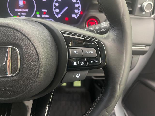 ヴェゼル ｅ：ＨＥＶ　Ｚ　９型メーカーナビ　バックカメラ　衝突被害軽減システム　禁煙車　電動リアゲート　ハーフレザーシート　前後ドラレコ　コーナーセンサー　スマートキー　ＬＥＤヘッド　ＥＴＣ２．０　オートハイビーム（7枚目）