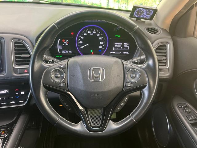 ヴェゼル ハイブリッドZ・ホンダセンシング 純正ナビ バックカメラ 衝突被害軽減システム 禁煙車 ハーフレザーシート ドラレコ コーナーセンサー スマートキー LEDヘッド ビルトインETC 純正17インチアルミ 前席シートヒーター(12枚目)