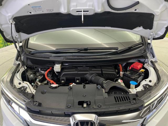 ステップワゴンスパーダ スパーダハイブリッド　Ｇ・ＥＸ　ホンダセンシング　純正９型ナビ　マルチビューカメラ　禁煙車　両側電動スライドドア　リアオートエアコン　ハーフレザーシート　前席シートヒーター　ＬＥＤヘッドライト＆フォグライト　ＥＴＣ　ドラレコ　電動パーキング（19枚目）