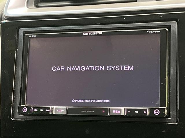 フィット １３Ｇ・Ｆパッケージ　ファインエディション　７インチナビ　バックカメラ　禁煙車　スマートキー　オートエアコン　Ｂｌｕｅｔｏｏｔｈ　アイドリングストップ　電動格納ミラー　ＣＤ　ＤＶＤ再生　フルセグ　ドアバイザー（4枚目）