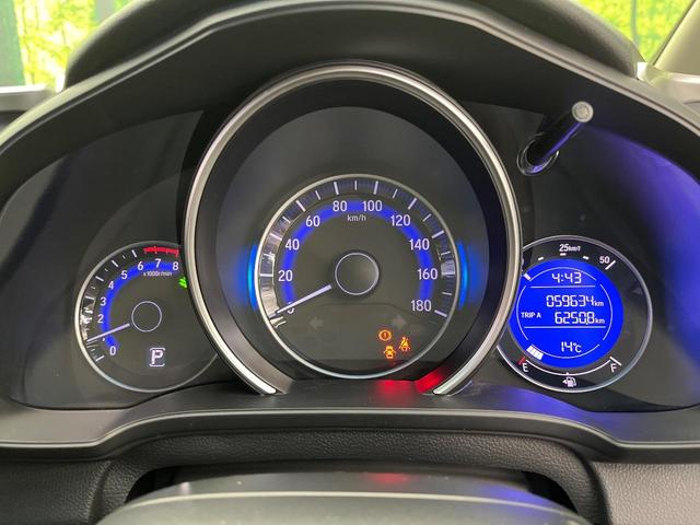 フィット １３Ｇ・Ｆパッケージ　ファインエディション　７インチナビ　バックカメラ　禁煙車　スマートキー　オートエアコン　Ｂｌｕｅｔｏｏｔｈ　アイドリングストップ　電動格納ミラー　ＣＤ　ＤＶＤ再生　フルセグ　ドアバイザー（35枚目）