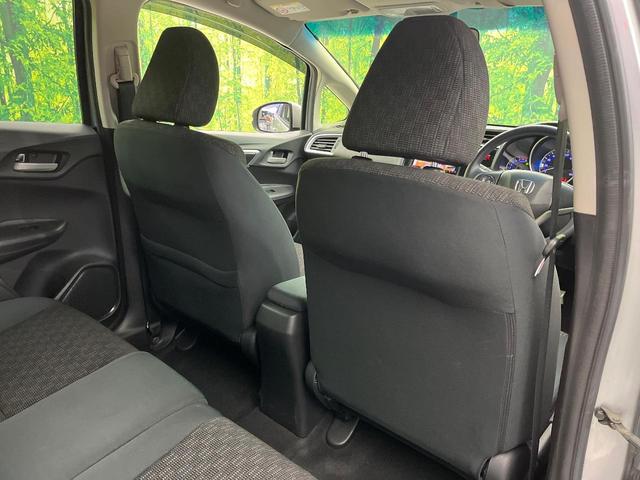 フィット １３Ｇ・Ｆパッケージ　ファインエディション　７インチナビ　バックカメラ　禁煙車　スマートキー　オートエアコン　Ｂｌｕｅｔｏｏｔｈ　アイドリングストップ　電動格納ミラー　ＣＤ　ＤＶＤ再生　フルセグ　ドアバイザー（43枚目）