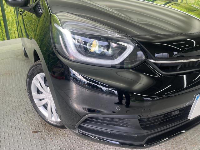 フィット ホーム　禁煙車　純正ナビ　バックカメラ　レーダークルーズコントロール　衝突被害軽減システム　ドラレコ　コーナーセンサー　スマートキー　ＬＥＤヘッド　ＥＴＣ　オートハイビーム　車線逸脱警報　オートライト（13枚目）