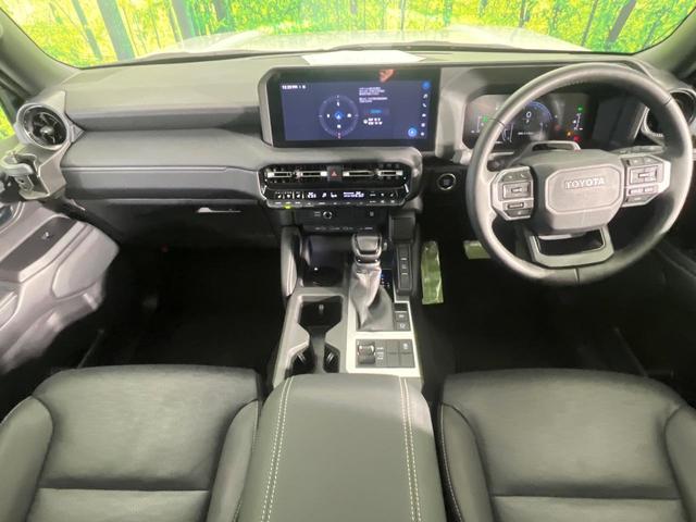 ランドクルーザー２５０ ＶＸ　モデリスタ　ムーンルーフ　純正１２．３型ナビ　ＯＰ１眼ＬＥＤ　７人乗り　全周囲カメラ　黒革　ＢＳＭ　禁煙車　電動リアゲート　ルーフレール　デジタルミラー　シートベンチレーション（3枚目）