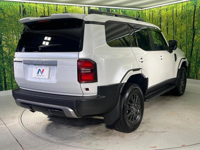 ランドクルーザー２５０ ＶＸ　モデリスタ　ムーンルーフ　純正１２．３型ナビ　ＯＰ１眼ＬＥＤ　７人乗り　全周囲カメラ　黒革　ＢＳＭ　禁煙車　電動リアゲート　ルーフレール　デジタルミラー　シートベンチレーション（27枚目）