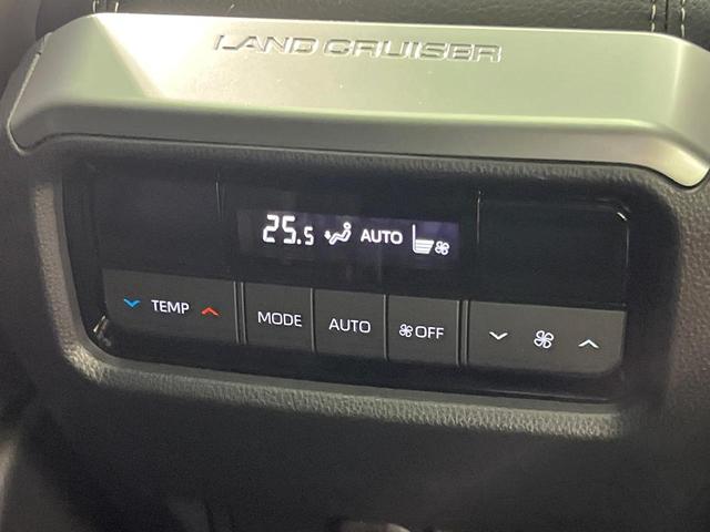 ランドクルーザー２５０ ＶＸ　モデリスタ　ムーンルーフ　純正１２．３型ナビ　ＯＰ１眼ＬＥＤ　７人乗り　全周囲カメラ　黒革　ＢＳＭ　禁煙車　電動リアゲート　ルーフレール　デジタルミラー　シートベンチレーション（76枚目）