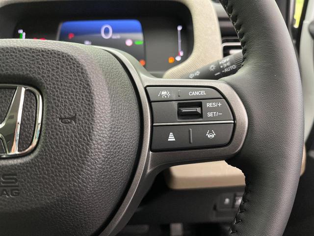 フリード ｅ：ＨＥＶエアー　ＥＸ　登録済未使用車　ホンダセンシング　両側電動スライドドア　ブラインドスポットモニター　前席シートヒーター　ＬＥＤヘッド　ロールサンシェイド　スマートキー＆プッシュスタート　リアクーラー（5枚目）