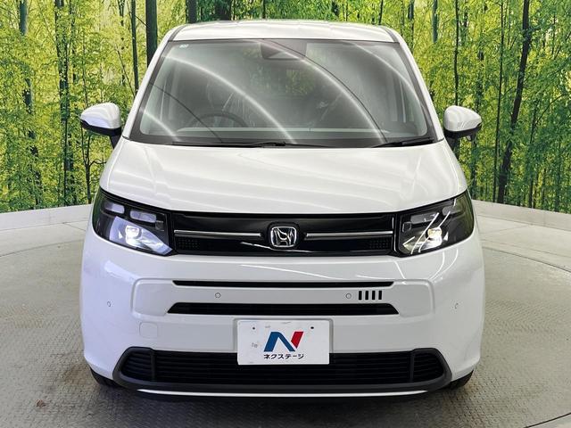 フリード ｅ：ＨＥＶエアー　ＥＸ　登録済未使用車　ホンダセンシング　両側電動スライドドア　ブラインドスポットモニター　前席シートヒーター　ＬＥＤヘッド　ロールサンシェイド　スマートキー＆プッシュスタート　リアクーラー（16枚目）