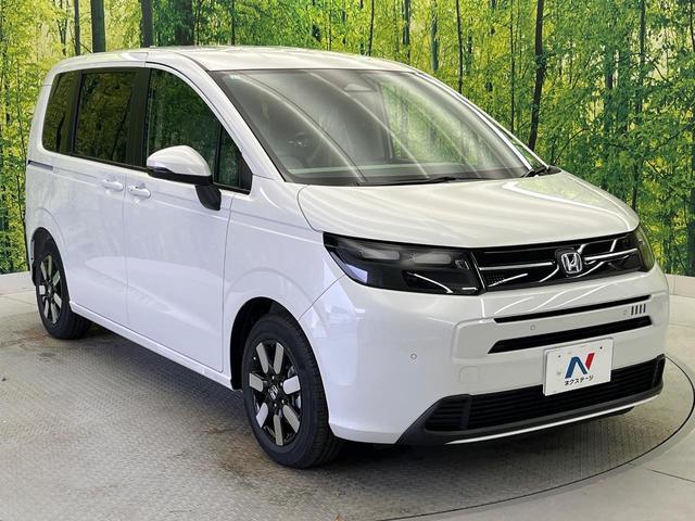 フリード ｅ：ＨＥＶエアー　ＥＸ　登録済未使用車　ホンダセンシング　両側電動スライドドア　ブラインドスポットモニター　前席シートヒーター　ＬＥＤヘッド　ロールサンシェイド　スマートキー＆プッシュスタート　リアクーラー（18枚目）