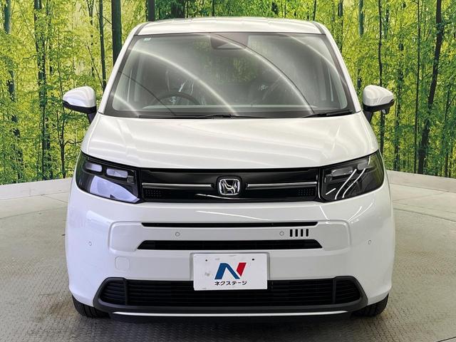 フリード ｅ：ＨＥＶエアー　ＥＸ　登録済未使用車　ホンダセンシング　両側電動スライドドア　ブラインドスポットモニター　前席シートヒーター　ＬＥＤヘッド　ロールサンシェイド　スマートキー＆プッシュスタート　リアクーラー（25枚目）