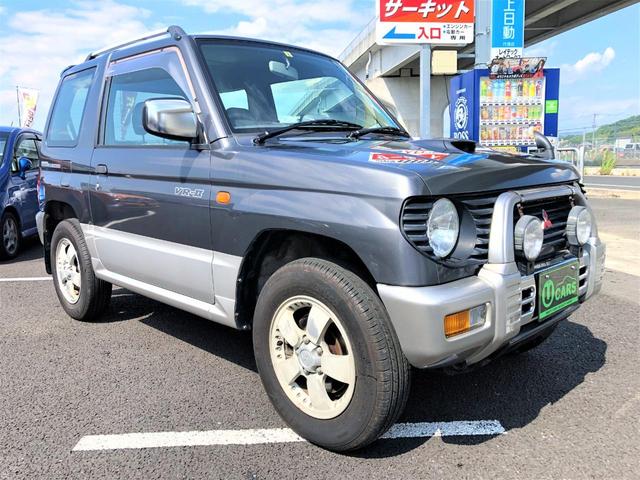 パジェロミニ アニバーサリーリミテッド－Ｖ　後期　ターボ　パートタイム４ＷＤ　フォグランプ　取扱説明書　１５ＡＷ　背面カバー　ルーフレール　ハイマウント付ルーフスポイラー　クライノメーター　Ｄ席エアバッグ　オーディオ　エアコン　パワステ（10枚目）