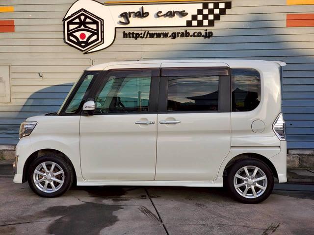 タント カスタムＸ　ＳＡ　社外ナビ　地デジ　Ｂｌｕｅｔｏｏｔｈ　バックカメラ　ＥＴＣ車載器　クラッツィオシートカバー　リアモニター１０．２インチ　スマートキー　１４インチ純正アルミ　左側パワースライドドア　スマートアシスト（8枚目）