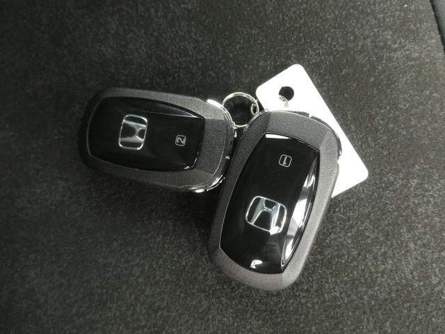 Ｎ－ＢＯＸカスタム ターボ　デモカー　９インチナビ　バックカメラ　ドラレコ　ＥＴＣ　アダプティブクルーズコントロール　両側電動スライドドア　シートヒーター　Ｂｌｕｅｔｏｏｔｈ　ＬＥＤヘッドライト　衝突被害軽減ブレーキ（62枚目）