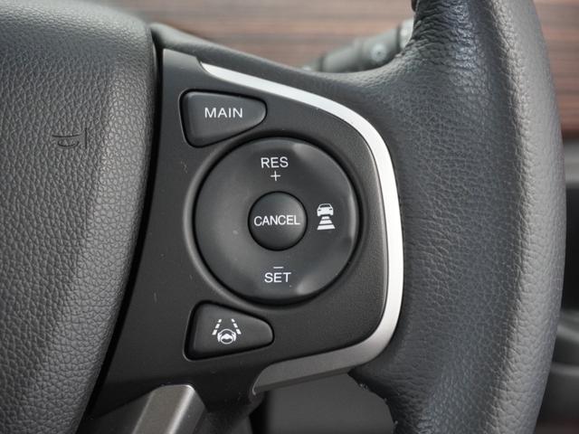 フリードハイブリッド ハイブリッド・クロスターホンダセンシング　２年保証ナビＲカメＥＴＣ両電扉ＢＴ地デジＬＥＤ　アダプティブクルーズコントロール　Ｂｌｕｅｔｏｏｔｈ　シートヒーター　フルセグＴＶ　２列目ウォークスルー　純正アルミホイール（9枚目）
