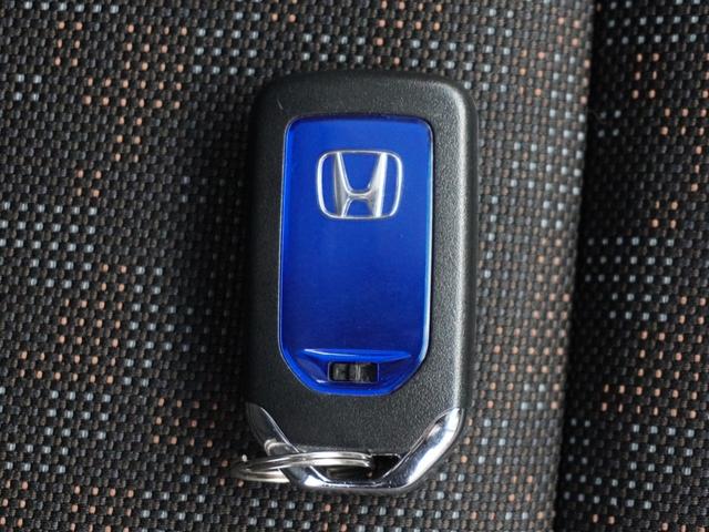 フリードハイブリッド ハイブリッド・クロスターホンダセンシング　２年保証ナビＲカメＥＴＣ両電扉ＢＴ地デジＬＥＤ　アダプティブクルーズコントロール　Ｂｌｕｅｔｏｏｔｈ　シートヒーター　フルセグＴＶ　２列目ウォークスルー　純正アルミホイール（18枚目）