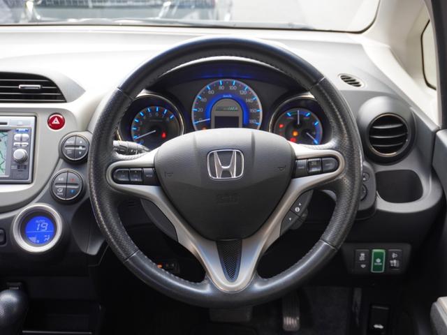 フィットハイブリッド スマートセレクション　ワンオーナー車　ナビ（純正用品　ＶＸＭ－１２８ＶＳ）　バックカメラ　ＥＴＣ　クルーズコントロール　ＵＳＢ入力端子　ワンセグ　盗難防止装置　パワーステアリング　パワーウィンドウ　オートエアコン（53枚目）