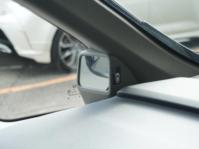 ステップワゴンスパーダ スパーダホンダセンシング　ワンオーナー　９インチナビ　後席フリップダウンモニター　バックカメラ　ドラレコ　ＥＴＣ２．０対応　アダプティブクルーズコントロール　両側電動スライドドア　シートヒーター　純正アルミホイール　禁煙車（69枚目）