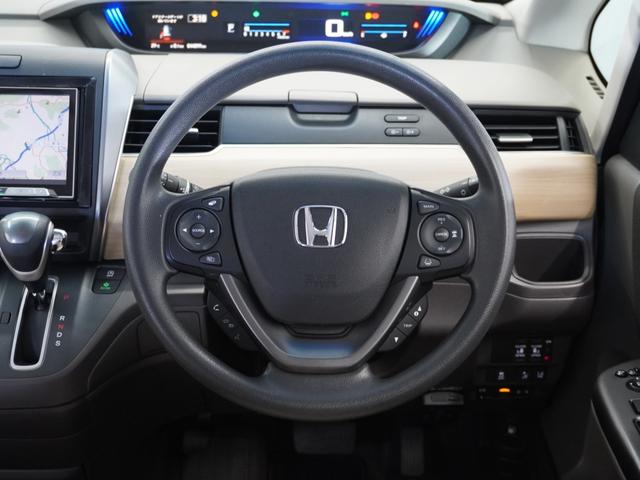 フリード Ｇ・ホンダセンシング　１年保証ナビＤレコＲカメＥＴＣ両電扉ＢＴ地デジ　アダプティブクルーズコントロール　Ｂｌｕｅｔｏｏｔｈ　ＬＥＤヘッドライト　７人乗り３列シート　オートライト　横滑り防止装置　スペアキー有り（9枚目）