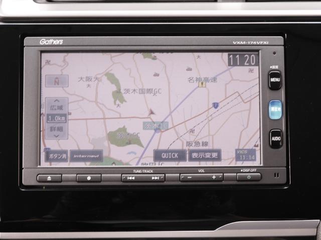 フィット １３Ｇ・Ｆパッケージファインエディション　ワンオーナー　７インチナビ　バックカメラ　ＥＴＣ　Ｂｌｕｅｔｏｏｔｈ　パドルシフト　アイドリングストップ　盗難防止装置　オートエアコン　パワーステアリング　パワーウィンドウ　ＣＤ　ＤＶＤ　ＡＢＳ（3枚目）