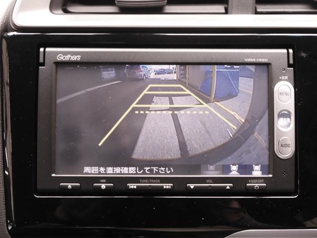 フィットハイブリッド Ｌパッケージ　７インチナビ（純正用品　ＶＸＭ－１４５Ｃ）　バックカメラ　ＥＴＣ　クルーズコントロール　ＬＥＤオートライト　サイドエアバック　衝突被害軽減ブレーキ　盗難防止装置　　オートエアコン（4枚目）