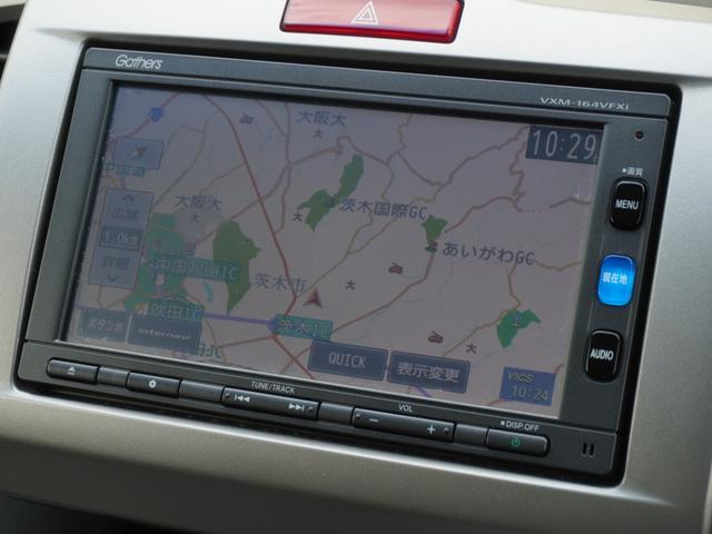 フリードハイブリッド ハイブリッドプレミアムエディション　ワンオーナー　純正７インチナビ（ＶＸＭ－１６４ＶＦＸｉ）　フルセグ　リアカメラ　ＥＴＣ　両側電動ドア　ウォークスルー　クルーズコントロール　ＨＩＤオートライト　アイドリングストップ　Ｂｌｕｅｔｏｏｔｈ（3枚目）