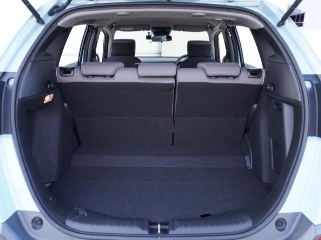 フィット ｅ：ＨＥＶクロスター　４ＷＤ　ワンオーナー車　社外ディスプレイオーディオ　ドラレコ　ＥＴＣ　障害物センサー　Ｂｌｕｅｔｏｏｔｈ　ＬＥＤオートライト　サイドエアバック　衝突被害軽減ブレーキ　純正アルミホイール（58枚目）