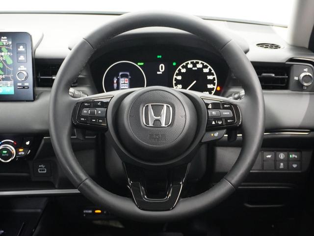 ヴェゼル e:HEVZ 1年保証ナビRカメETCクルコンBT地デジLED 渋滞追従クルーズ Bluetooth ハンドルヒーター 本革巻きハンドル 障害物センサー シートヒーター 減速セレクター ヒルディセントコントロール(8枚目)