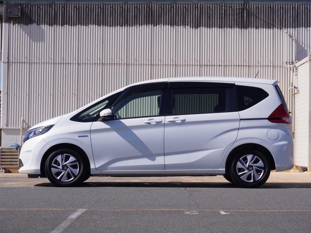 フリードハイブリッド ハイブリッド・Ｇホンダセンシング　ワンオーナー　９インチナビ　バックカメラ　ドラレコ　ＥＴＣ　アダプティブクルーズコントロール　両側電動スライドドア　Ｂｌｕｅｔｏｏｔｈ　フルセグ　ＬＥＤヘッドライト　衝突被害軽減ブレーキ　禁煙車（6枚目）