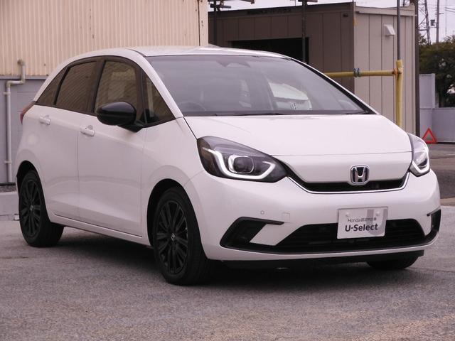 フィット ｅ：ＨＥＶホーム２０周年特別仕様車カーサ　７インチナビ　バックカメラ　ＥＴＣ　アダプティブクルーズコントロール　シートヒーター　Ｂｌｕｅｔｏｏｔｈ　ＵＳＢ入力端子　ＬＥＤヘッドライト　衝突被害軽減ブレーキ　純正アルミホイール　禁煙車（25枚目）