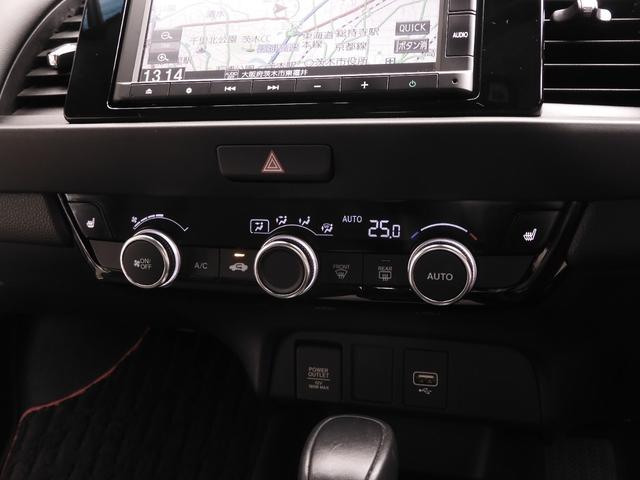 フィット ｅ：ＨＥＶホーム２０周年特別仕様車カーサ　７インチナビ　バックカメラ　ＥＴＣ　アダプティブクルーズコントロール　シートヒーター　Ｂｌｕｅｔｏｏｔｈ　ＵＳＢ入力端子　ＬＥＤヘッドライト　衝突被害軽減ブレーキ　純正アルミホイール　禁煙車（59枚目）