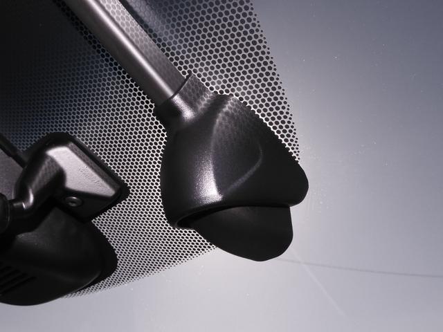 フリードハイブリッド ハイブリッド・Ｇホンダセンシング　ワンオーナー　９インチナビ　バックカメラ　ドラレコ　ＥＴＣ　後席フリップダウンモニター　アダプティブクルーズコントロール　フルセグ　両側電動スライドドア　シートヒーター　Ｂｌｕｅｔｏｏｔｈ　禁煙車（6枚目）