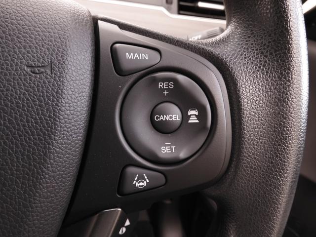 フリードハイブリッド ハイブリッド・Ｇホンダセンシング　ワンオーナー　９インチナビ　バックカメラ　ドラレコ　ＥＴＣ　後席フリップダウンモニター　アダプティブクルーズコントロール　フルセグ　両側電動スライドドア　シートヒーター　Ｂｌｕｅｔｏｏｔｈ　禁煙車（18枚目）