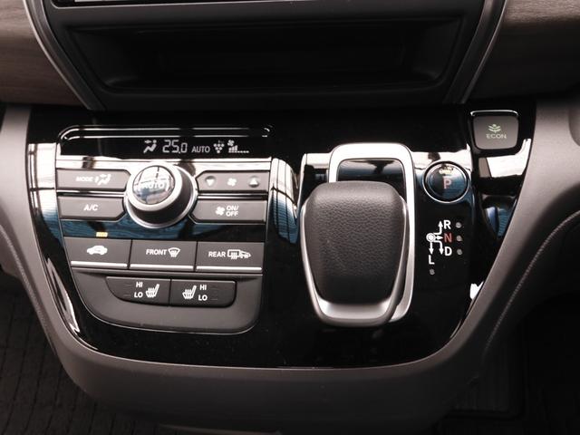 フリードハイブリッド ハイブリッド・Ｇホンダセンシング　ワンオーナー　９インチナビ　バックカメラ　ドラレコ　ＥＴＣ　後席フリップダウンモニター　アダプティブクルーズコントロール　フルセグ　両側電動スライドドア　シートヒーター　Ｂｌｕｅｔｏｏｔｈ　禁煙車（50枚目）