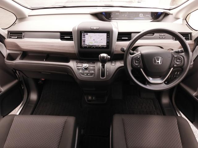 フリード Ｇ・ホンダセンシング　ワンオーナー車　７インチナビ（純正用品ＶＸＭ－２１４ＶＦｉ）バックカメラ　ドラレコ　ＥＴＣ　両側電動スライドドア　シートヒーター　Ｂｌｕｅｔｏｏｔｈ　ＬＥＤオートライト　衝突被害軽減ブレーキ（8枚目）