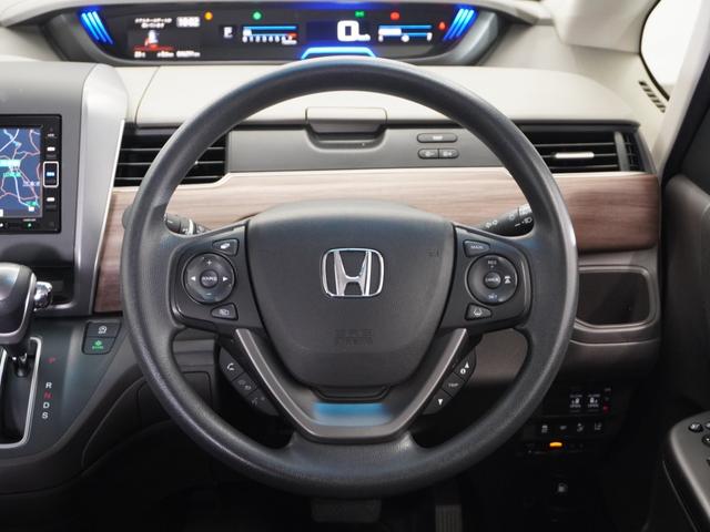 フリード Ｇ・ホンダセンシング　２年保証ナビＲカメＤレコＥＴＣ両電扉ＢＴ地デジ　アダプティブクルーズコントロール　Ｂｌｕｅｔｏｏｔｈ　シートヒーター　ＬＥＤヘッドライト　フルセグＴＶ　ＤＶＤ再生　スペアキー有り（10枚目）