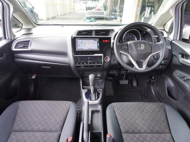 フィット 13G・Fパッケージ ワンオーナー車 純正7インチナビ(VXM-174VFXi) フルセグ リアカメラ ETC チップアップシート アイドリングストップ フロアマット CD DVD Bluetooth SD スマートキー(7枚目)