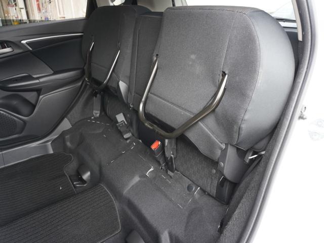 フィット 13G・Fパッケージ ワンオーナー車 純正7インチナビ(VXM-174VFXi) フルセグ リアカメラ ETC チップアップシート アイドリングストップ フロアマット CD DVD Bluetooth SD スマートキー(10枚目)