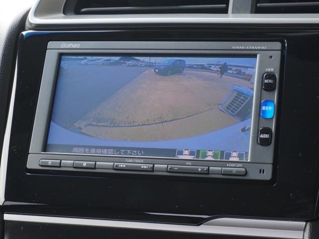 フィット 13G・Fパッケージ ワンオーナー車 純正7インチナビ(VXM-174VFXi) フルセグ リアカメラ ETC チップアップシート アイドリングストップ フロアマット CD DVD Bluetooth SD スマートキー(60枚目)