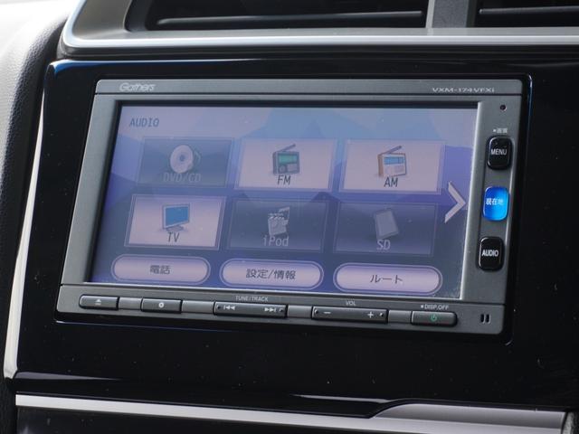 フィット 13G・Fパッケージ ワンオーナー車 純正7インチナビ(VXM-174VFXi) フルセグ リアカメラ ETC チップアップシート アイドリングストップ フロアマット CD DVD Bluetooth SD スマートキー(61枚目)