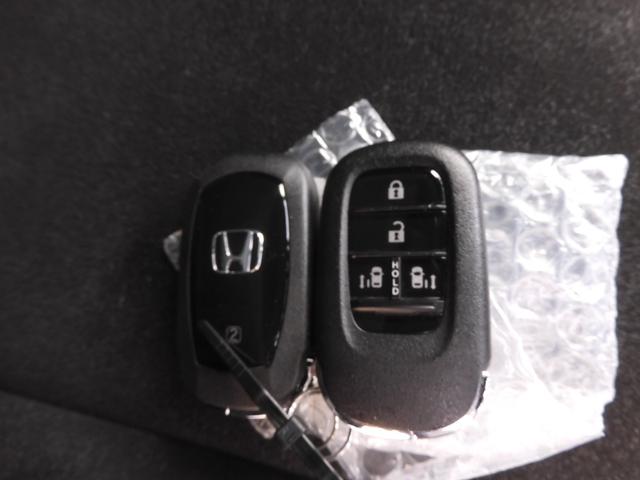 Ｎ－ＢＯＸカスタム ターボ　デモカー　９インチナビ　バックカメラ　ドラレコ　ＥＴＣ　アダプティブクルーズコントロール　両側電動スライドドア　シートヒーター　Ｂｌｕｅｔｏｏｔｈ　ＬＥＤヘッドライト　衝突被害軽減ブレーキ　禁煙車（38枚目）